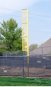 Picture of Gared 5-9/16” O.D. Surface Mount 30’ Yellow Foul Pole, 18’ L X 18” W Wing Panel